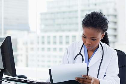 Doctor writing a prescription Doctor writing a prescription