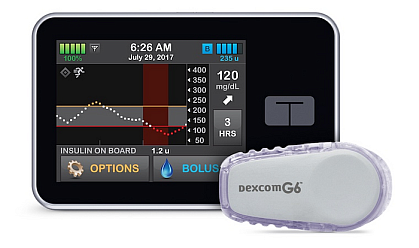 A glucose monitor with a small unit showing insulin levels. A glucose monitor with a small unit showing insulin levels.
