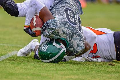 High school football player landing on his head High school football player landing on his head