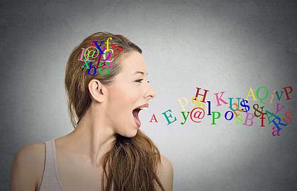 Side view portrait of a woman talking with alphabet letters in her head and coming out of her open mouth. Side view portrait of a woman talking with alphabet letters in her head and coming out of her open mouth.