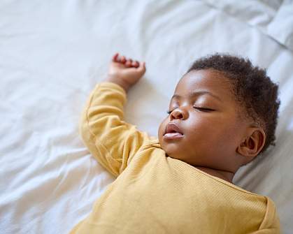Infant girl lying on back. Infant girl lying on back.