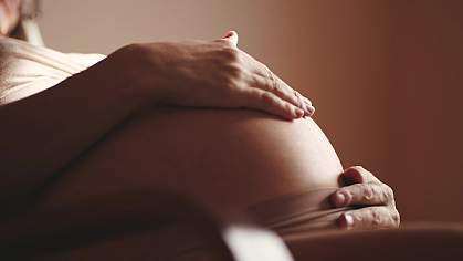 Close-up belly of a pregnant woman. Close-up belly of a pregnant woman.