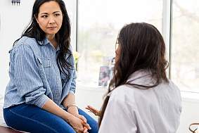 image of a woman speaking with a doctor