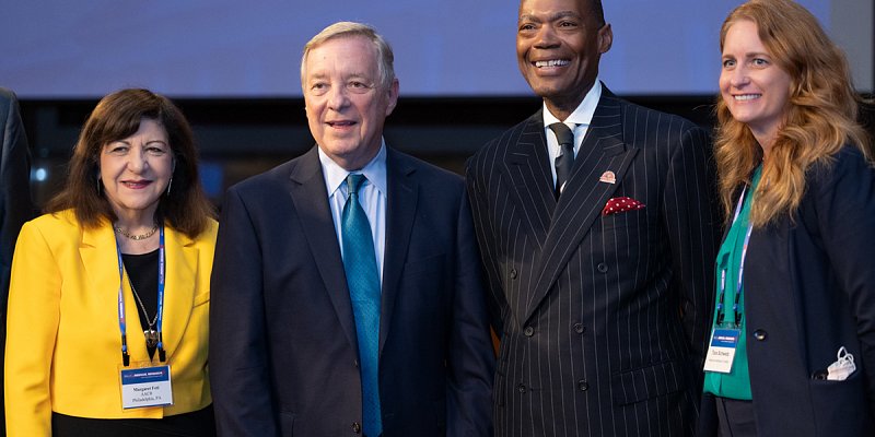 Dr. Tara Schwetz (far right) provided remarks at a reception ahead of the annual Rally for Biomedical Research. Here she is photographed with Senator Dick Durbin (2nd from left) and organizers of the event. 