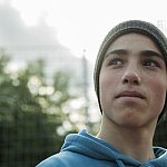 Image of a teenage boy outside