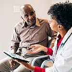 Patient listening to doctor