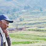 Pensive older Native American man in the countryside.